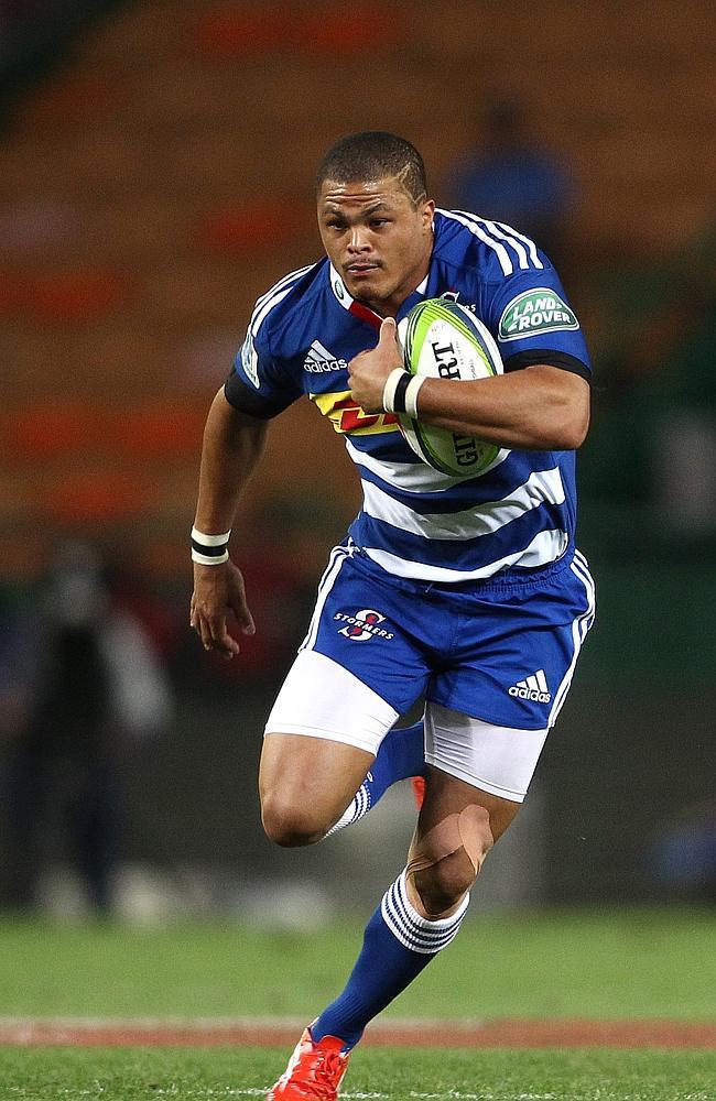 Juan de Jongh on the attack against the Waratahs at Newlands Stadium.