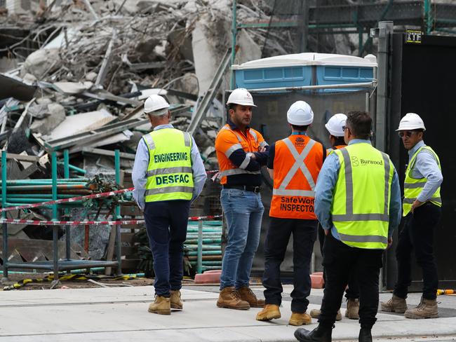 SYDNEY, AUSTRALIA : NewsWire Photos - JANUARY 23 2025; Residents were left stranded after more than 50 people were forced to evacuate following the partial collapse of a 10-storey building in SydneyÃs inner west, with part of Railway Pde still closed. Police, Fire and Rescue NSW (FRNSW) and SafeWork NSW were called to the construction site on Railway Pde in Burwood just after 3pm Wednesday after reports of a building falling onto an excavator. Picture: NewsWire/ Gaye Gerard