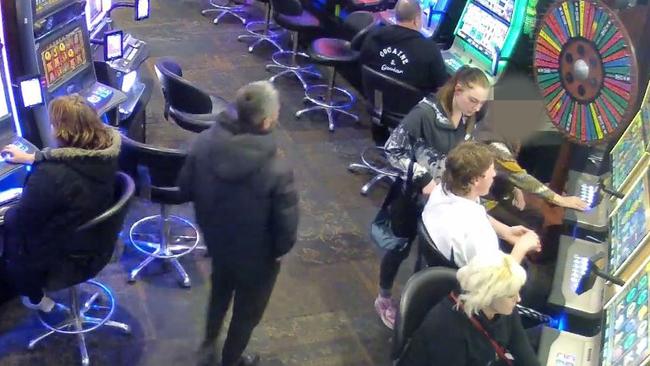 Nima Saboohian watches his 85-year-old woman victim who he would later rob of her pokies winnings. Picture Courts Administration Authority.