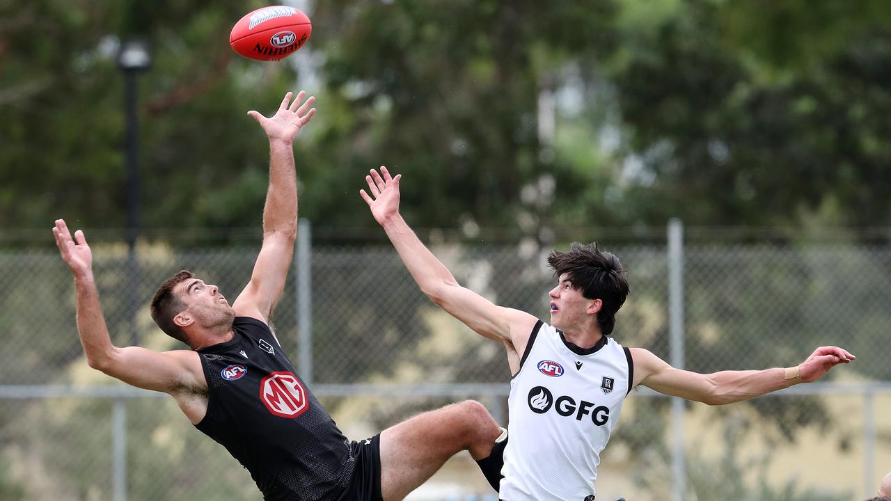 Dante Visentini (right) goes head-to-head in the ruck with Port Adelaide veteran Scott Lycett in an intraclub game this pre-season. Picture: Sarah Reed