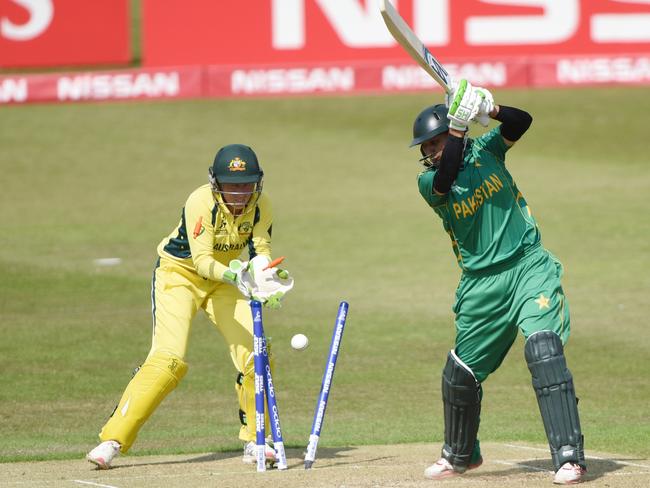 Asmavia Iqbal of Pakistan is clean bowled as Australia posted another commanding win.