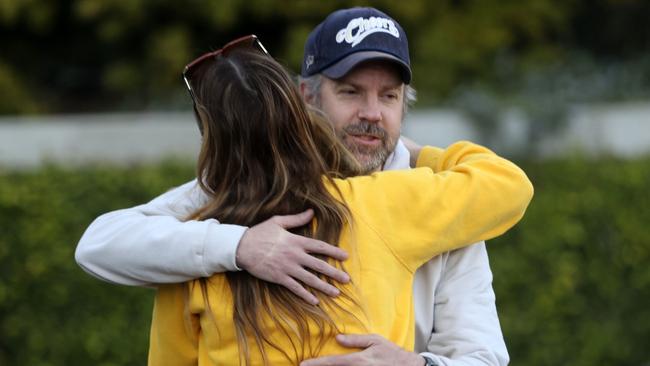 Olivia Wilde and Jason Sudeikis show they are finally on good terms as they leave a meeting together in Hollywood on Friday afternoon. Picture: Backgrid Australia