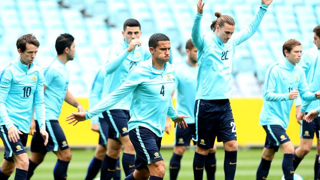 Tim Cahill warms up as Socceroos train at ANZ Stadium in the Sydney Olympic Park precinct ahead of Tuesday nights second leg of the World Cup play off against Syria.