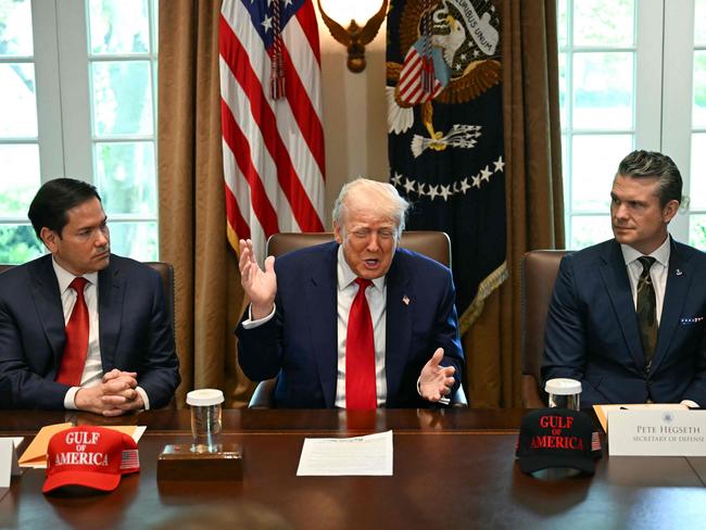 US President Donald Trump, flanked by Secretary of State Marco Rubio and Defense Secretary Pete Hegseth, speaks during a cabinet meeting in the Cabinet Room of the White House in Washington, DC. Picture: AFP