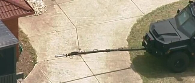 Police negotiated with a 22-year-old man for several hours before arresting him just before 7pm. Picture: 7 News