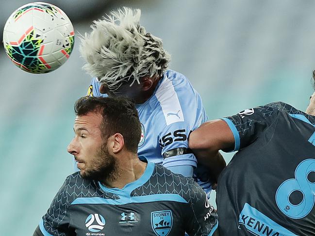 SYDNEY, AUSTRALIA - AUGUST 01: Lachlan Wales of Melbourne City competes for the ball with Adam le Fondre and Paulo Retre of Sydney FC during the round 29 A-League match between Melbourne City and Sydney FC at ANZ Stadium on August 01, 2020 in Sydney, Australia. (Photo by Mark Metcalfe/Getty Images)