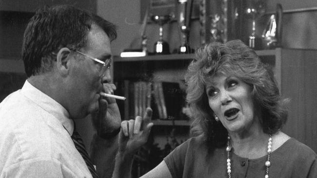 Actors Anne Charleston and Ian Smith on the set of TV show Neighbours, 1988.