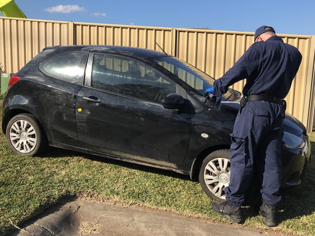 Police are on the hunt for a driver who initiated a police pursuit after failing to stop in Horsley this morning. The car was found abandoned in Boddington Way, Horsely. Picture: Madeline Crittenden