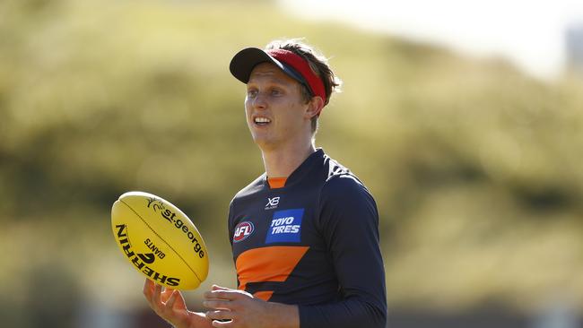 Lachie Whitfield will play despite suffering concussion in Round 3.