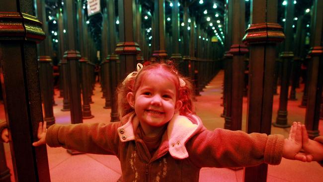 Ebony enjoys the mirror maze.