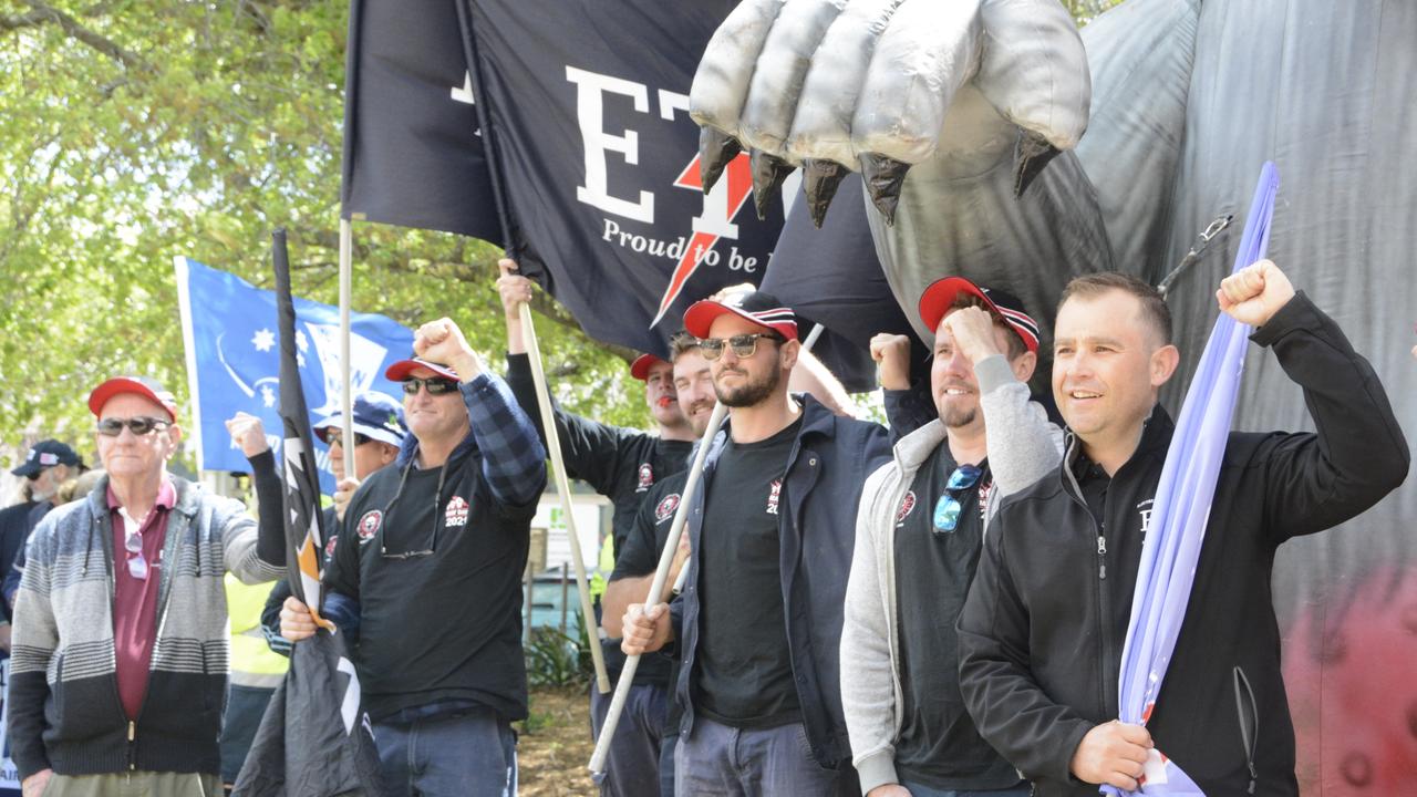 Electrical Trades Union members strike outside Toowoomba City Hall.