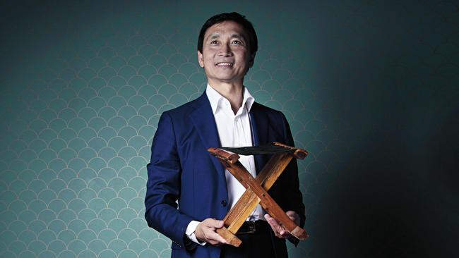 Li Cunxin with his father's stool. Picture: Justine Walpole