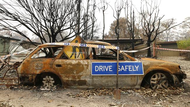 Mallacoota is littered with burnt-out cars. Picture: David Caird