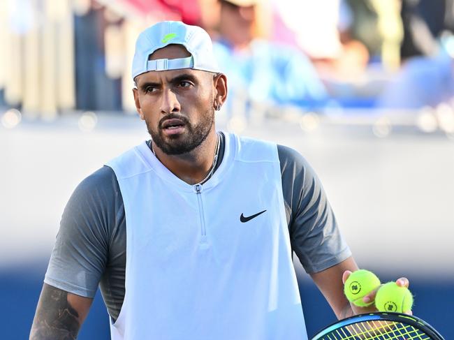 MONTREAL, QUEBEC - AUGUST 11:  Nick Kyrgios of Australia looks on as he prepares to serve against Alex de Minaur of Australia during Day 6 of the National Bank Open at Stade IGA on August 11, 2022 in Montreal, Canada.  (Photo by Minas Panagiotakis/Getty Images)