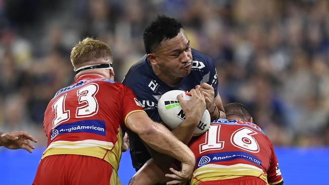 TOWNSVILLE, AUSTRALIA - MAY 04: Kulikefu Finefeuiaki of the Cowboys is tackled during the round nine NRL match between North Queensland Cowboys and Dolphins at Qld Country Bank Stadium, on May 04, 2024, in Townsville, Australia. (Photo by Ian Hitchcock/Getty Images)