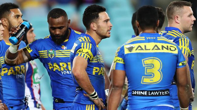 Parramatta players look on after a Newcastle try. Picture: Brett Costello
