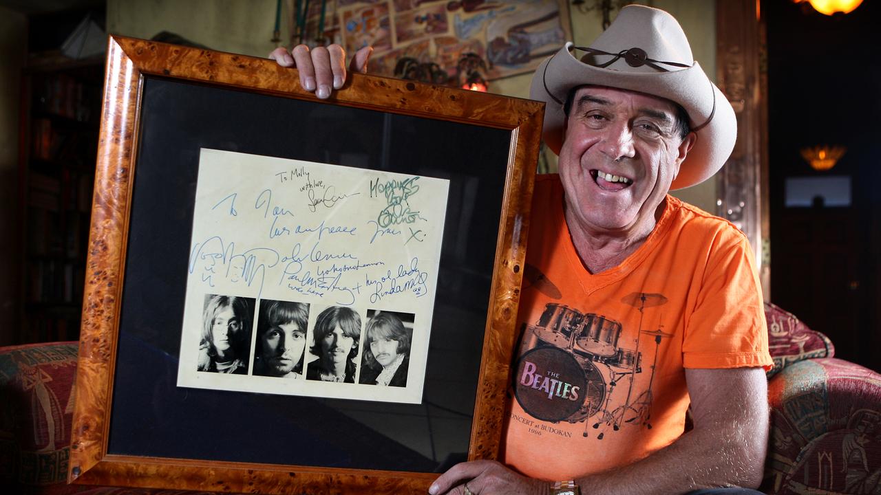 Molly Meldrum with his signed Beatles memorabilia.