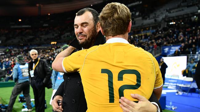 Kyle Godwin is congratulated by Michael Cheika following an impressive debut