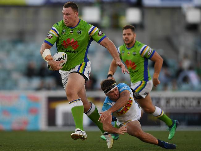 Gold Coast target Shannon Boyd of the Raiders breaks through the Titans flimsy defence — again. Picture: AAP Image/Lukas Coch