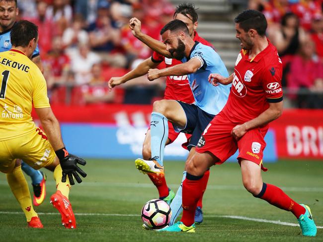 Alex Brosque takes on the Adelaide United defence for Sydney FC in their emphatic win at Coopers Stadium. Picture: Getty Images