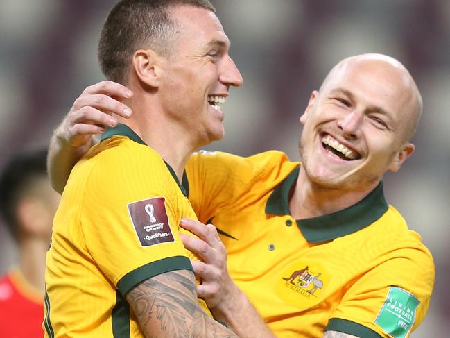 DOHA, QATAR - SEPTEMBER 02: Mitchell Duke of Australia  celebrates after scoring their team's third goal during the 2022 FIFA World Cup Qualifier match between Australia and China PR at Khalifa International Stadium on September 02, 2021 in Doha, Qatar. (Photo by Mohamed Farag/Getty Images)
