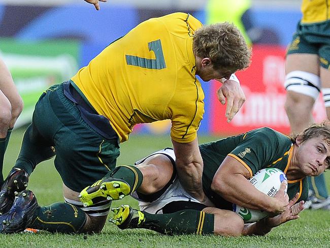 David Pocock crunches Patrick Lambie.