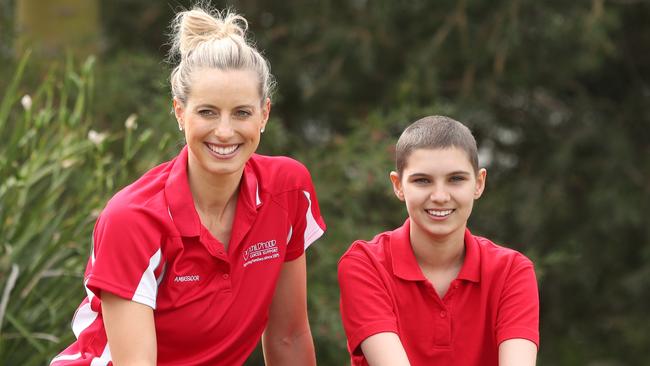 Laura Geitz with cancer survivor Brooke Kaluzyn ahead of a charity walk.