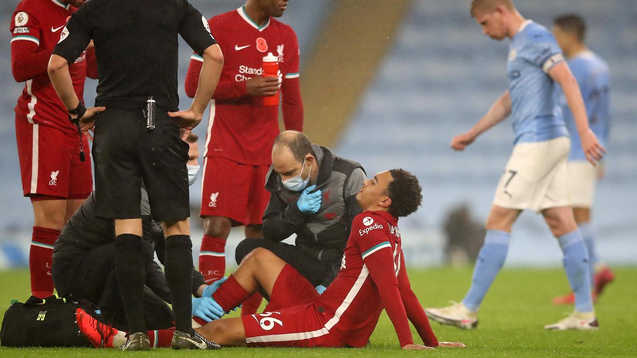 Trent Alexander-Arnold is out for four weeks. (Photo by Martin Rickett / POOL / AFP)