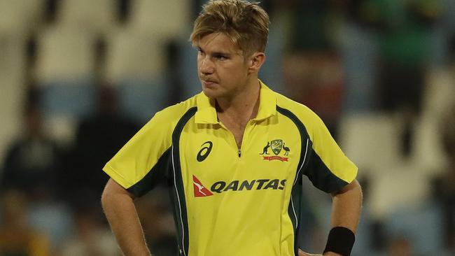 Adam Zampa looks dejected after being hit to the boundary.