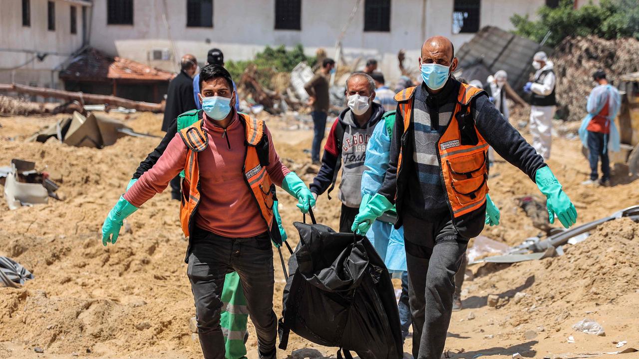 Bodies of dead Palestinians are uncovered in the vicinity of Al-Shifa Hospital in Gaza City. Picture: AFP