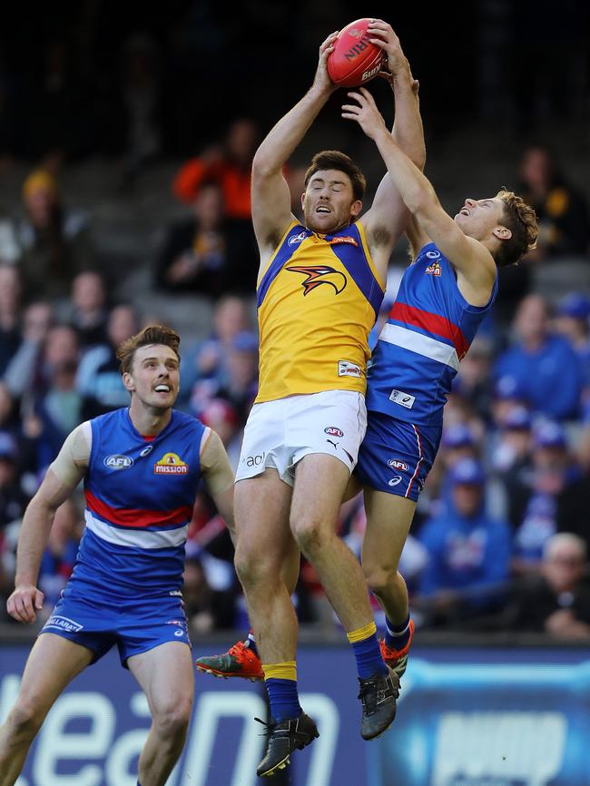 West Coast's Jeremy McGovern takes a strong defensive mark. Picture: Michael Klein