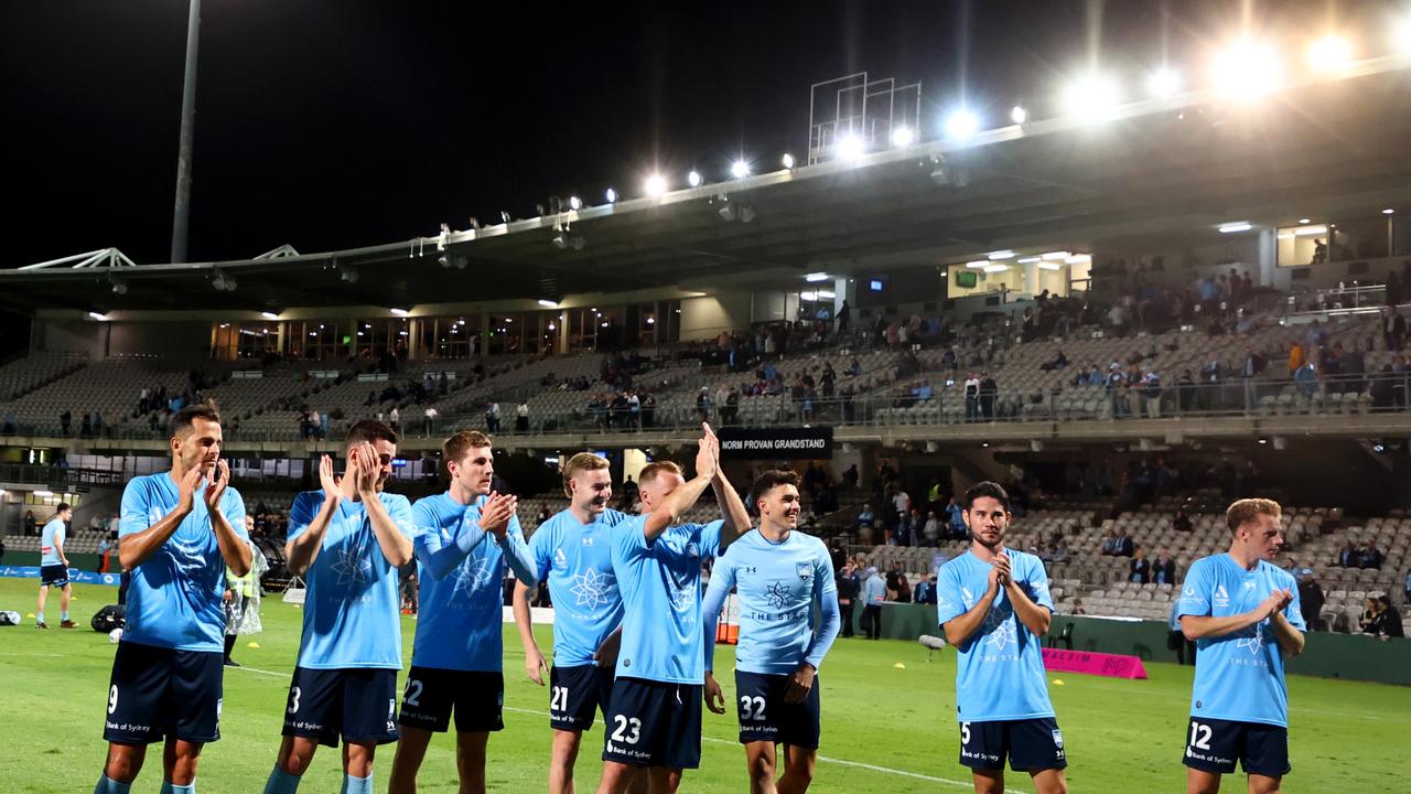 Sydney FC players salute their fans after beating Western United. Picture: Jeremy Ng/Getty Images