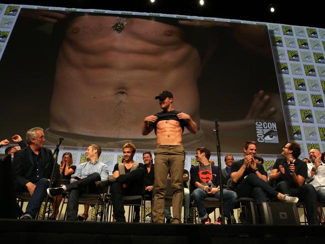 Stephen Amell with stars and executive producers from Gotham, Constantine, The Flash and Arrow attend the “DC Panel” at Comic-Con International 2014 on July 27, 2014 in San Diego, California. Picture: Getty