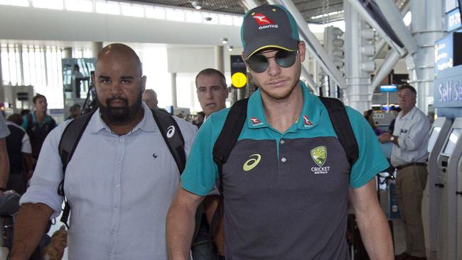 Steve Smith arrives with teammates, at the Cape Town International airport ahead of the flight to Johannesburg.