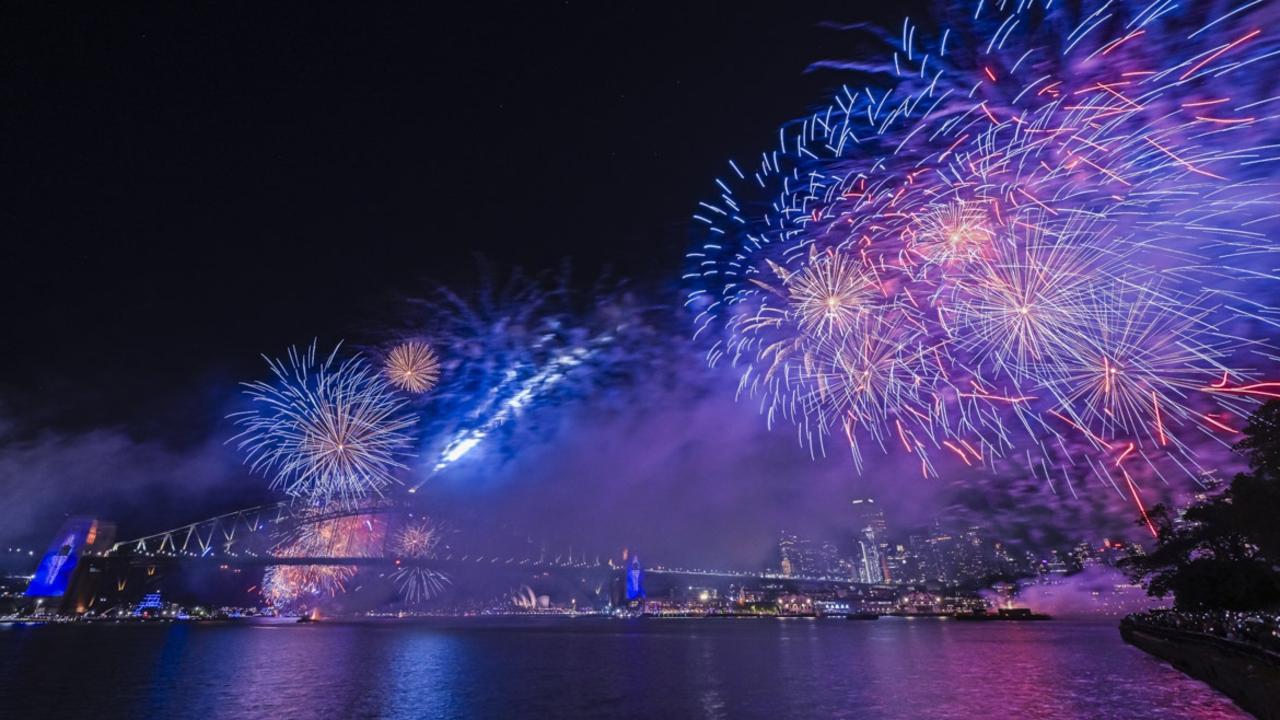 Midnight fireworks over Sydney Harbour on New Year’s Eve. Picture: Morris McLennan