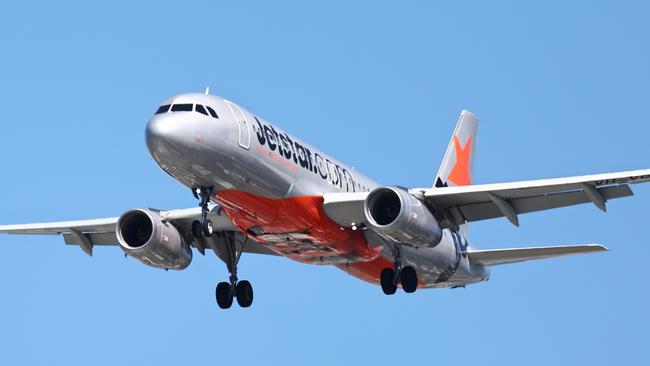 A Jetstar Airbus A320 commercial passenger jet plane comes into land at the Cairns International Airport, increasing tourism numbers in Far North Queensland. Picture: Brendan Radke