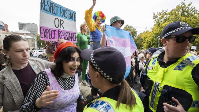 Activists clash with police outside the Tasmanian Parliament as Equality Tasmania and LGBTQI+ supporters counter protest a Let Women Speak rally. Picture: Chris Kidd