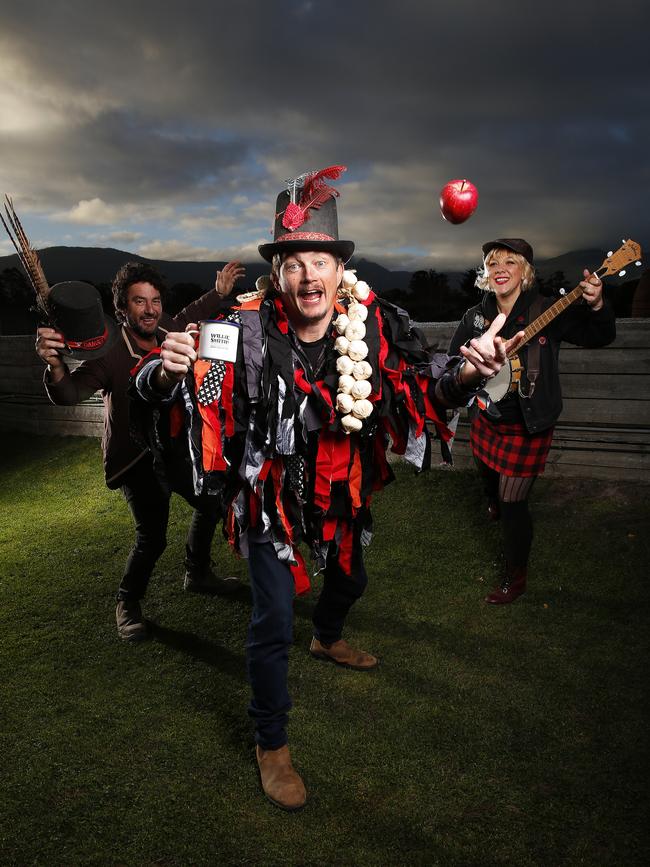 Huon Valley Mid-Winter festival co-founder and director Sam Reid and (rear) burning man creator, Marcus Gibbon and member of The Dead Maggies and the Stragglers, Teresa Dixon as the festival is going digital this year. Picture: Zak Simmonds