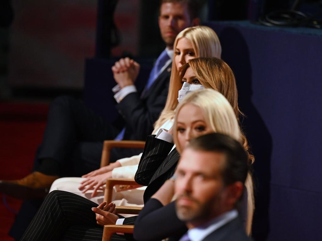 The Trump family arrived at the debate this week wearing masks but most took them off to watch. Picture: Jim WATSON / AFP.