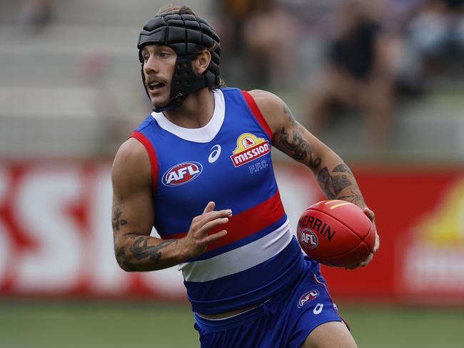 MELBOURNE , AUSTRALIA. February 23 , 2024.  AFL. Western Bulldogs vs Hawthorn at Whitten Oval.   Bulldog Caleb Daniel      . Pic: Michael Klein