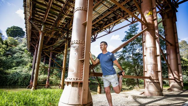 Jonathon Brown limbers up for the gruelling New York Marathon. Picture: Nicole Cleary