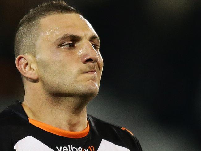 Tigers Robbie Farah looks on after the Tigers loss in the Wests Tigers v Melbourne Storm rugby league game at Campbelltown Stadium, Sydney. Pic Brett Costello