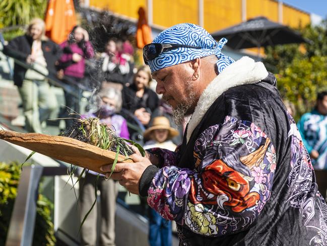 Jarowair Wakka Wakka man Conrad Bauwens conducts a Smoking Ceremony at the NAIDOC arts and craft market at Grand Central, Saturday, July 9, 2022. Picture: Kevin Farmer