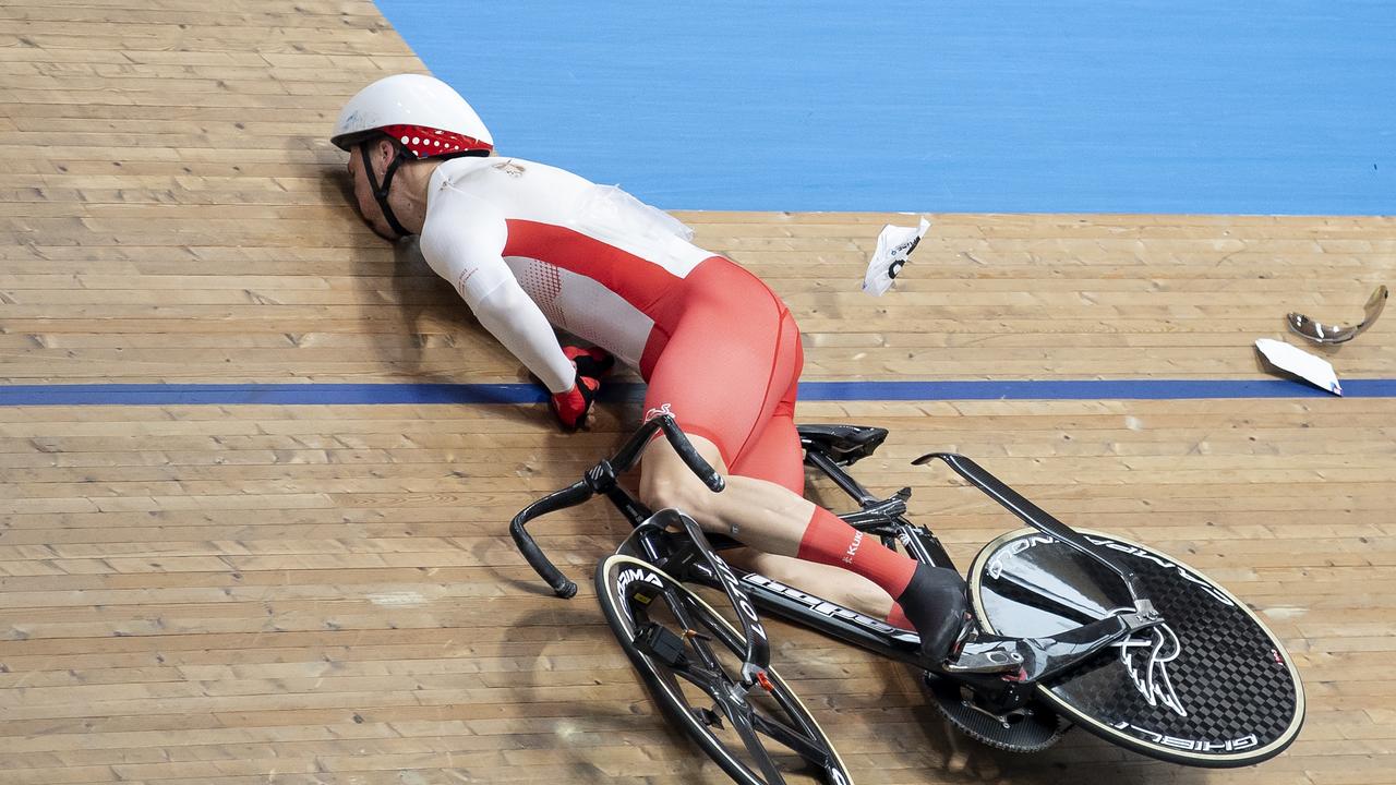 Joe Truman of England lays on the track after the horror crash at the velodrome. Picture: Justin Setterfield/Getty Images