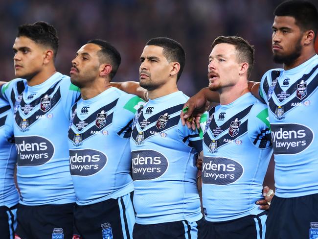 BRISBANE, AUSTRALIA - JUNE 05: Cody Walker of the Blues stands with team mates for the Australian national anthem during game one of the 2019 State of Origin series between the Queensland Maroons and the New South Wales Blues at Suncorp Stadium on June 05, 2019 in Brisbane, Australia. (Photo by Cameron Spencer/Getty Images)