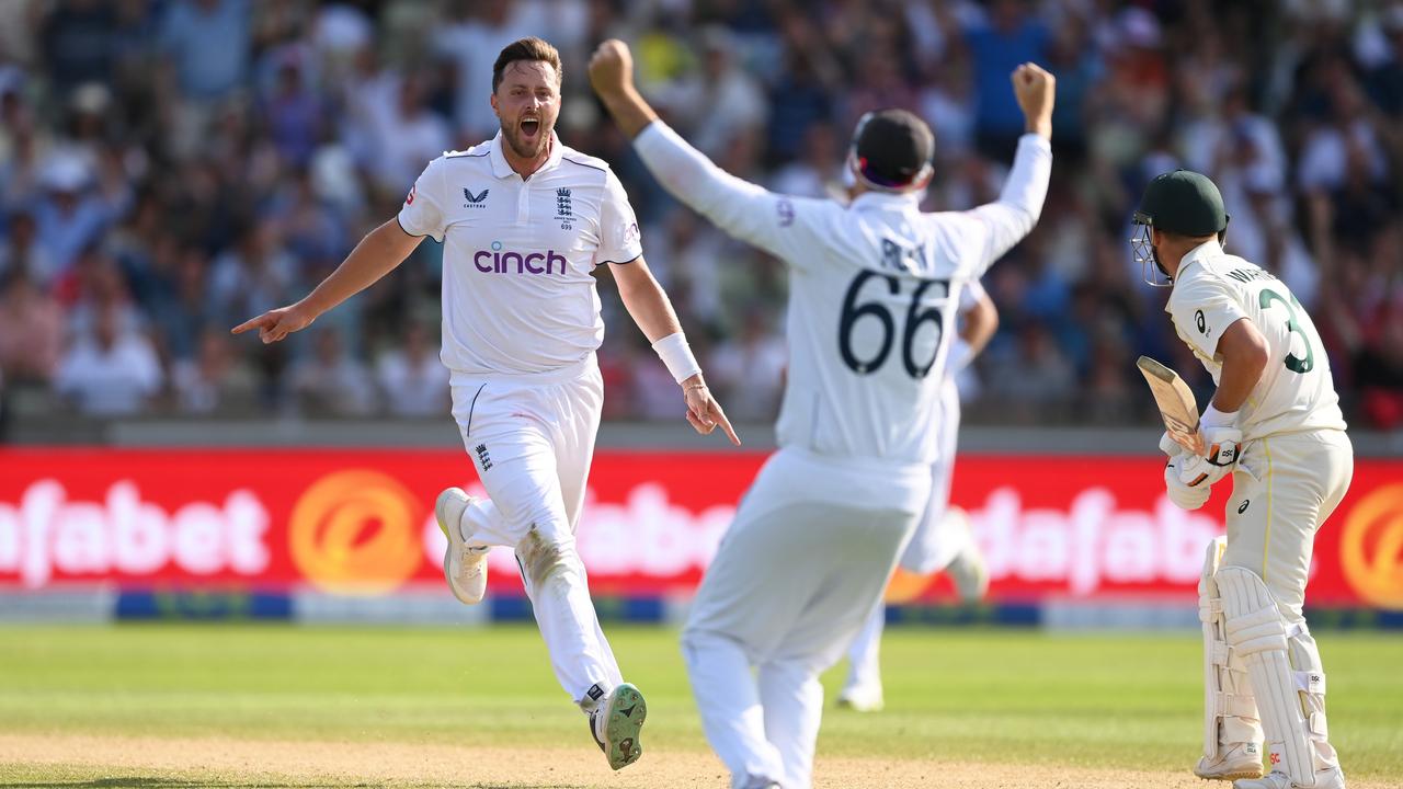 Ollie Robinson of England celebrates the wicket of David Warner of Australia. (Photo by Stu Forster/Getty Images) *** BESTPIX ***