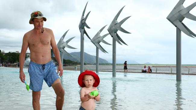 Oleg Suntsov and Gleb Suntsov, 19 months, of Cairns City enjoy their first swim back at the lagoon since its reopening. Picture: Brendan Radke