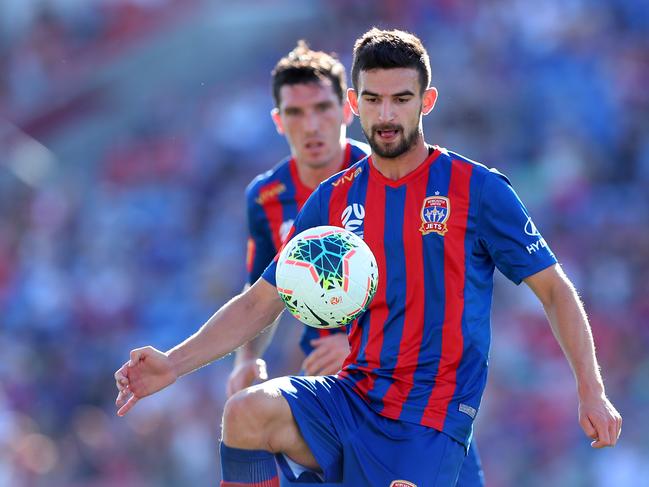 NEWCASTLE, AUSTRALIA - OCTOBER 26: Steven Ugarkovic of the Newcastle Jets controls the ball during the round three A-League match between the Newcastle Jets and Adelaide United at McDonald Jones Stadium on October 26, 2019 in Newcastle, Australia. (Photo by Tony Feder/Getty Images)