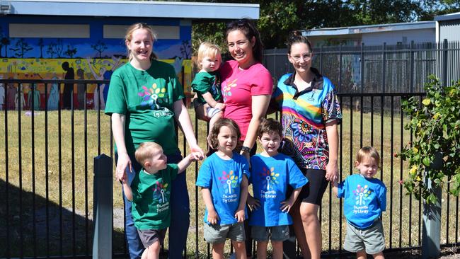 Michaela Wenman with Finn, Marion Mackenzie with Leo and Arlie and Stacey Prenter with Lachlan and William in front of the newly repaired fence.