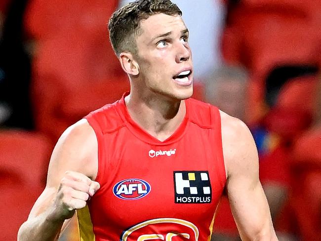 Josh Corbett celebrates a goal for the Suns. Picture: Bradley Kanaris/Getty Images